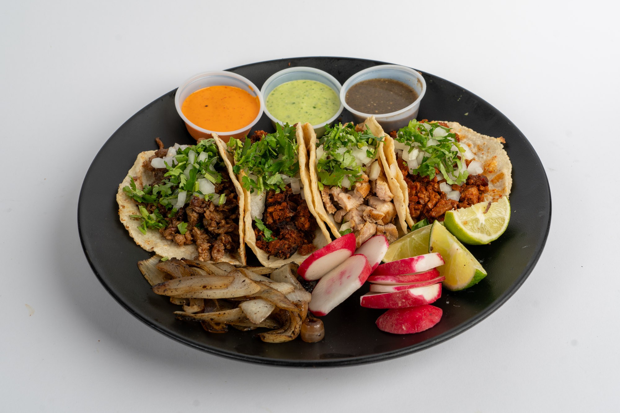 Birria Tacos - Slow-braised beef tacos